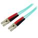StarTech.com Aqua OM4 Duplex Multimode Fiber - 1m / 3 ft - 100 Gb - 50/125 - OM4 Fiber - LC to LC Fiber Patch Cable - Connect 40GBase-SR4, 100GBase-SR10, SFP+ and QSFP+ transceivers in 40 and 100 Gigabit networks - Aqua OM4 Duplex Multimode Fiber - OM4 Fiber - 1m LC to LC Fiber Patch Cable - MM Fiber Optic Cable - Multimode Duplex Fiber Optic Cable - LC Fiber Cable